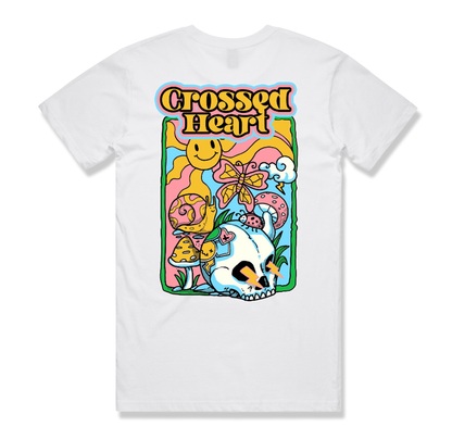 White alternative streetwear t-shirt featuring colorful skull, butterfly, mushroom, and smiley graphic with Crossed Heart text design