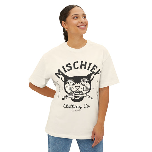 model wearing cream mischief oversized t shirt with cat graphic crossed heart clothing co relaxed fit streetwear tee