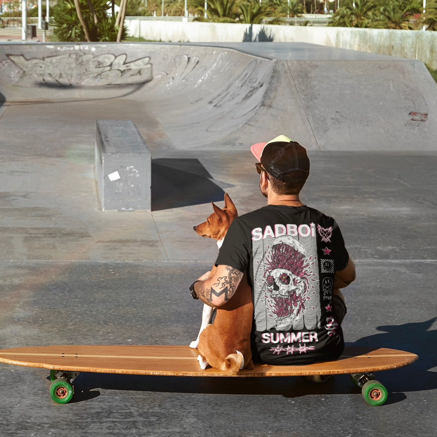 Lifestyle photo of Sadboi Summer Pop Punk Goes Reggae graphic t-shirt by Crossed Heart Clothing worn at a skate park featuring punk skull artwork on black alternative streetwear tee