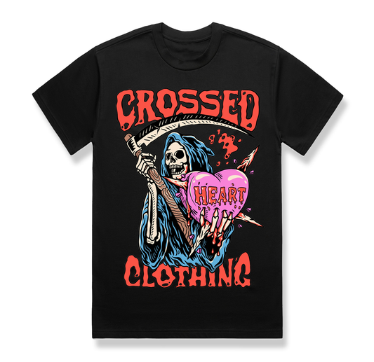 Black alternative streetwear t-shirt featuring grim reaper holding heart graphic with bold Crossed Heart Clothing lettering